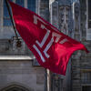 The Temple T flag outside of Morgan Hall on Main Campus 